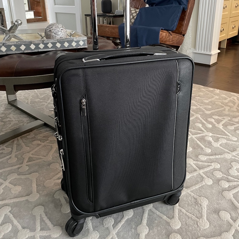 SOLD!!     Tumi Arrivé Continental Dual Access 4 wheeled Carry On